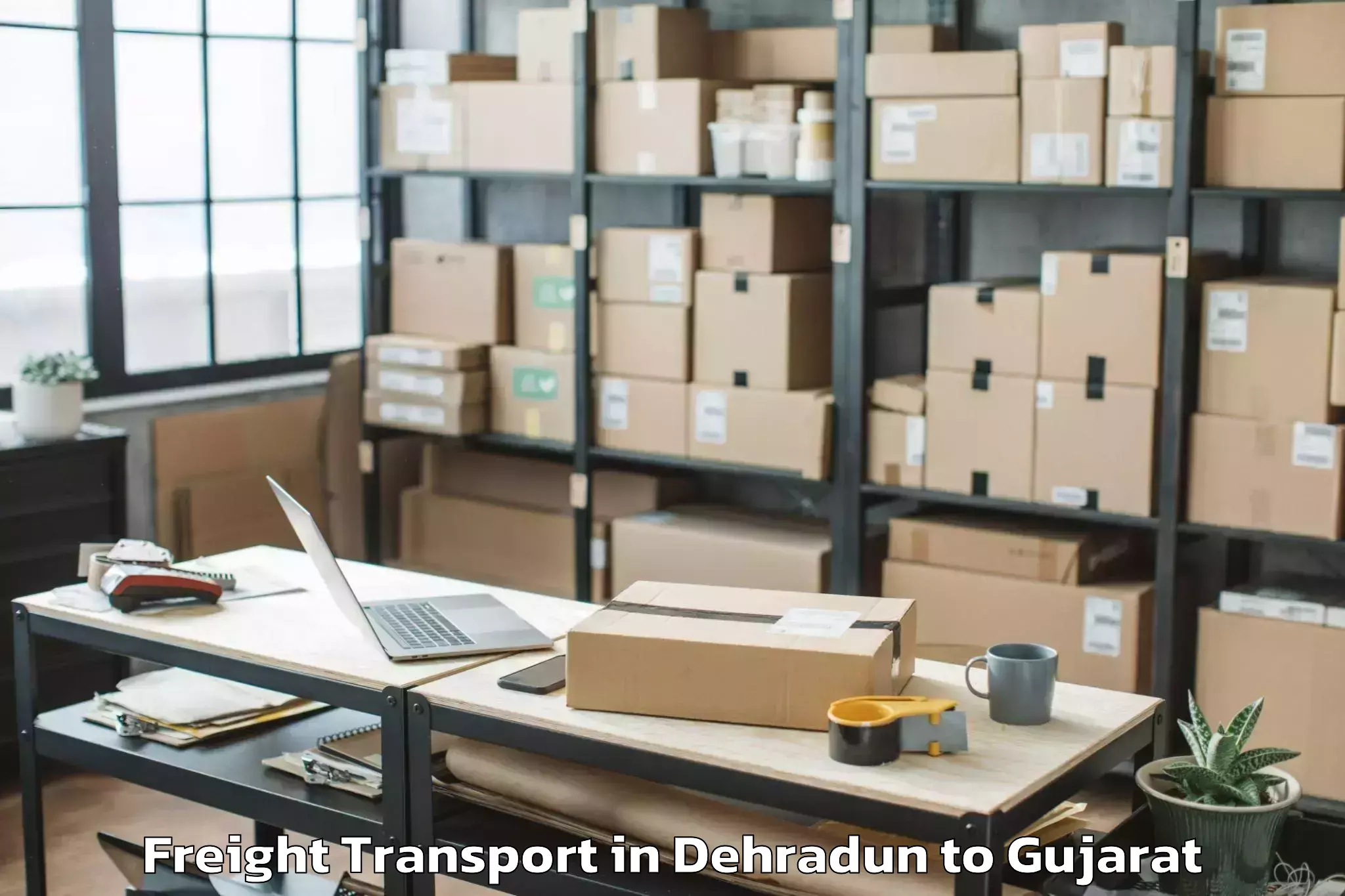 Book Dehradun to Deesa Freight Transport Online